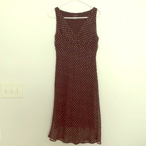 Polka dot sleeveless black dress